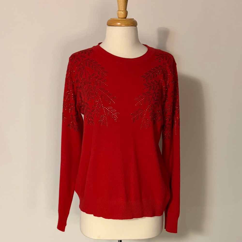 Red long sleeve rhinestone LIV sweater
Size M